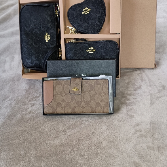 Coach Handbags - Coach Black and Tan Wallet Collection